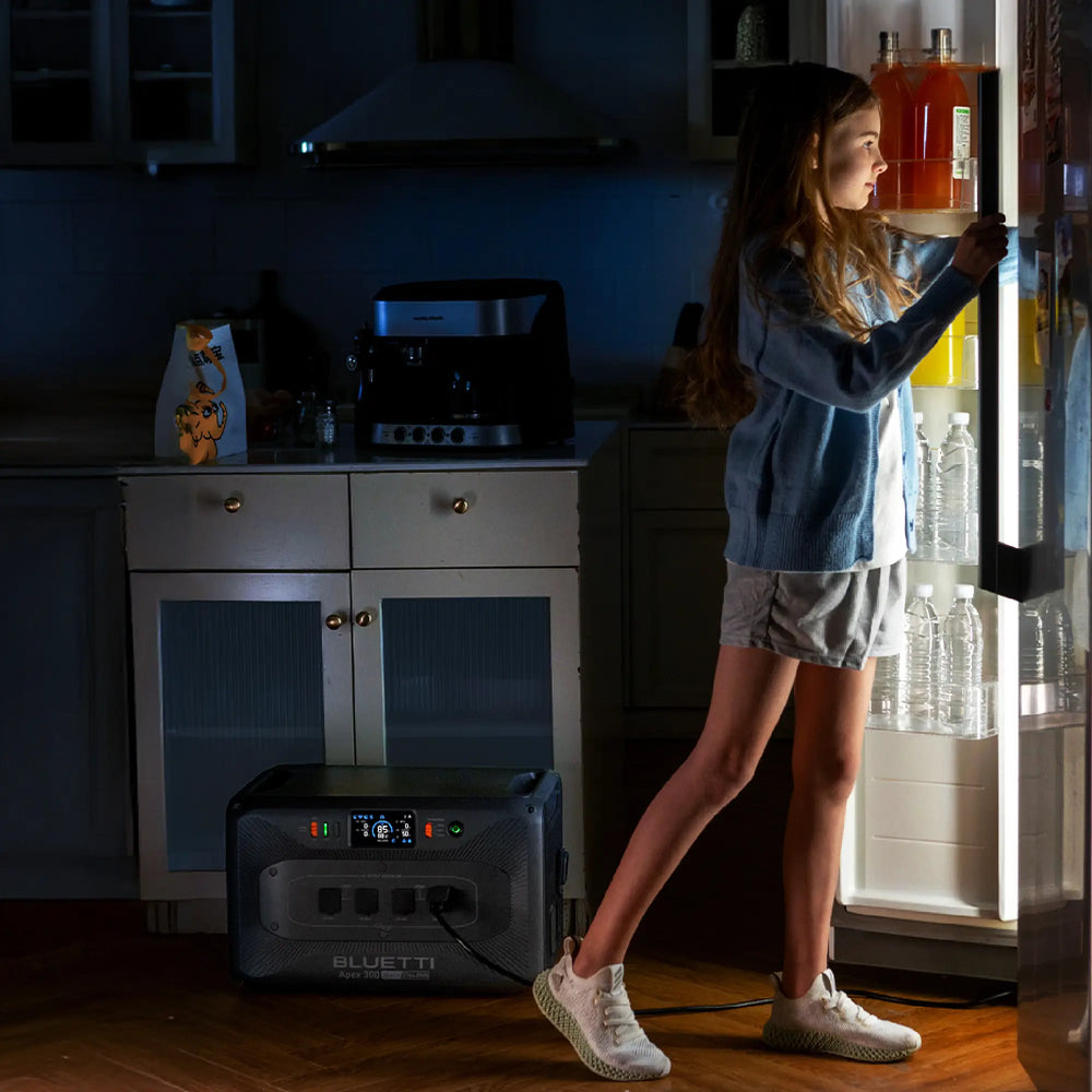 BLUETTI Apex 300 portable power station powers kitchen fridge for continued use.