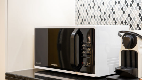 How Many Amps Does a Microwave Pull: Guide to Power Use and Safety